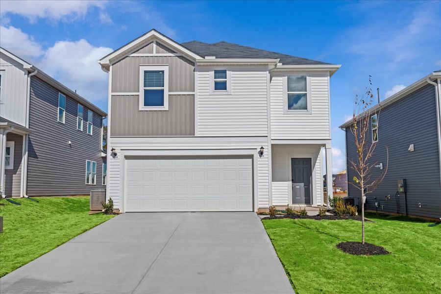 Front exterior of a new home in Creek Ridge - Heritage Collection, Spartanburg, SC, highlighting curb appeal (Image 1).