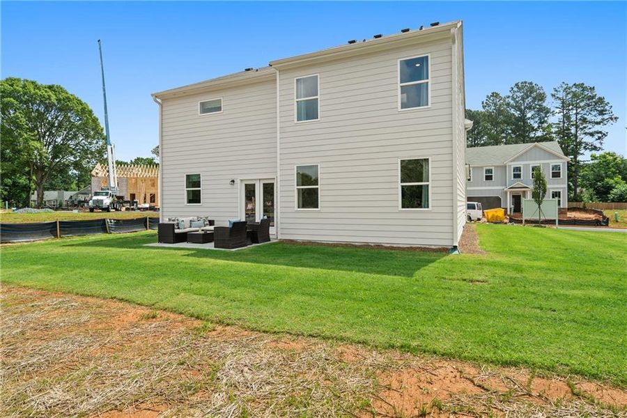 Exterior details and patio area of a home in Hickory Heights, Acworth (Image 24).