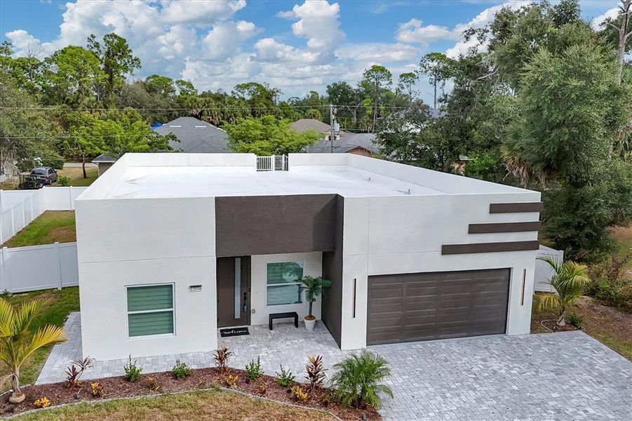 Front exterior of a new home in , Port Charlotte, FL, highlighting curb appeal (Image 20).