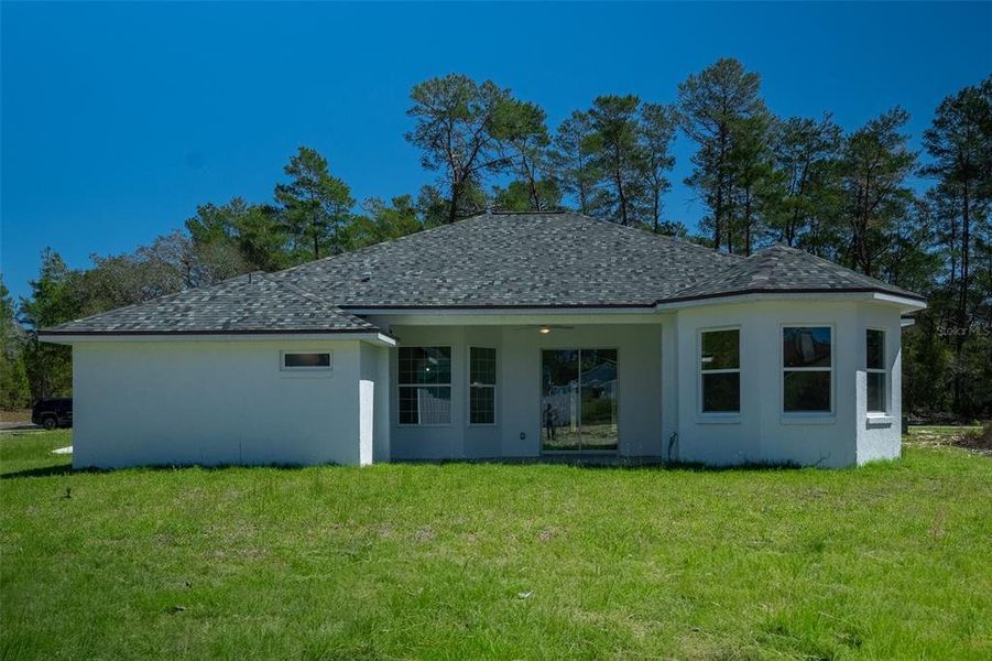 Exterior details and patio area of a home in , Ocala (Image 4).