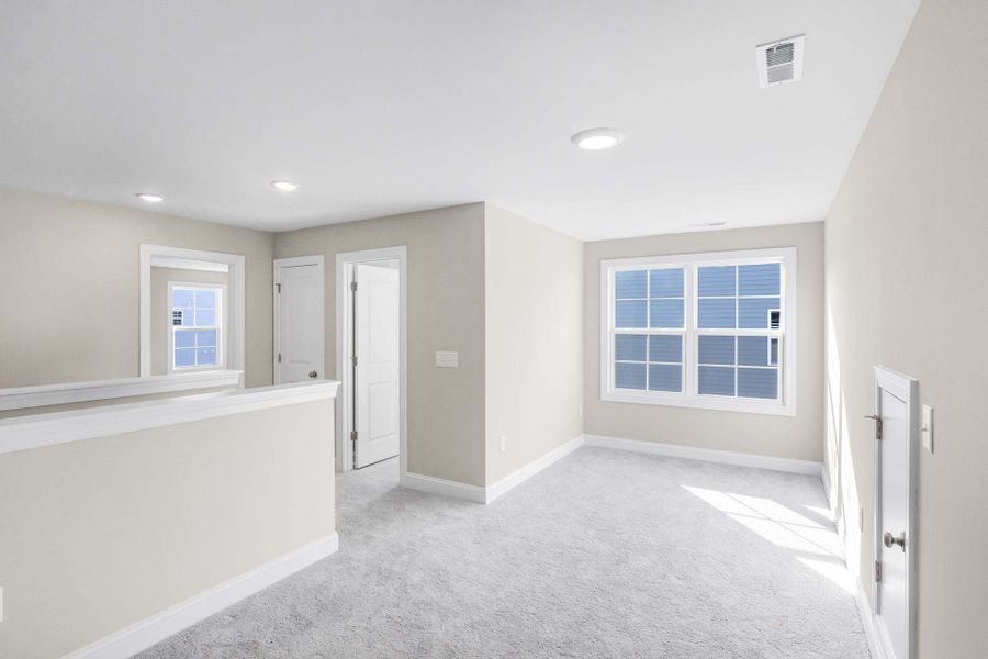 Representative unfurnished interior of a home built from the Clayton by Caviness & Cates Communities in Bartlett Manor, Youngsville (Image 203).