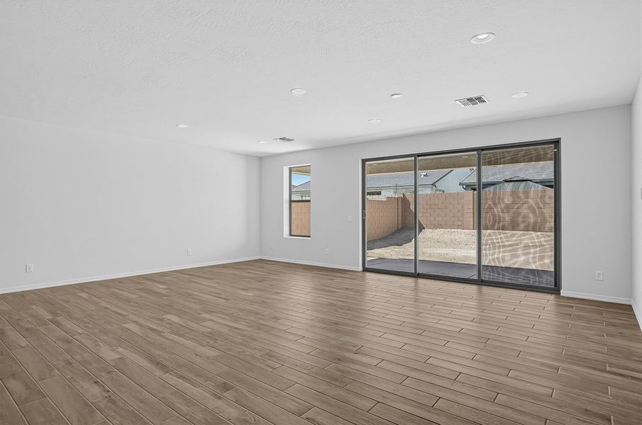 Spacious, unfurnished interior of a new home in Artisan at Asante, Surprise (Image 11).