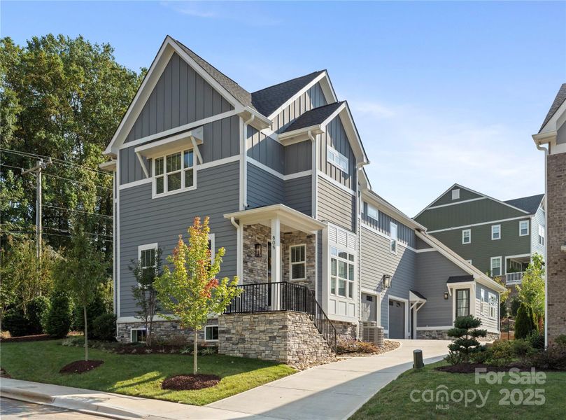Front exterior of a new home in , Davidson, NC, highlighting curb appeal (Image 1).