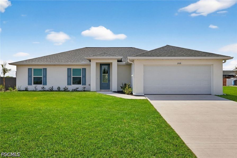Front exterior of a new home in Cape Coral, Cape Coral, FL, highlighting curb appeal (Image 1). Front exterior of a new home in Cape Coral, Cape Coral, FL, highlighting curb appeal (Image 1).