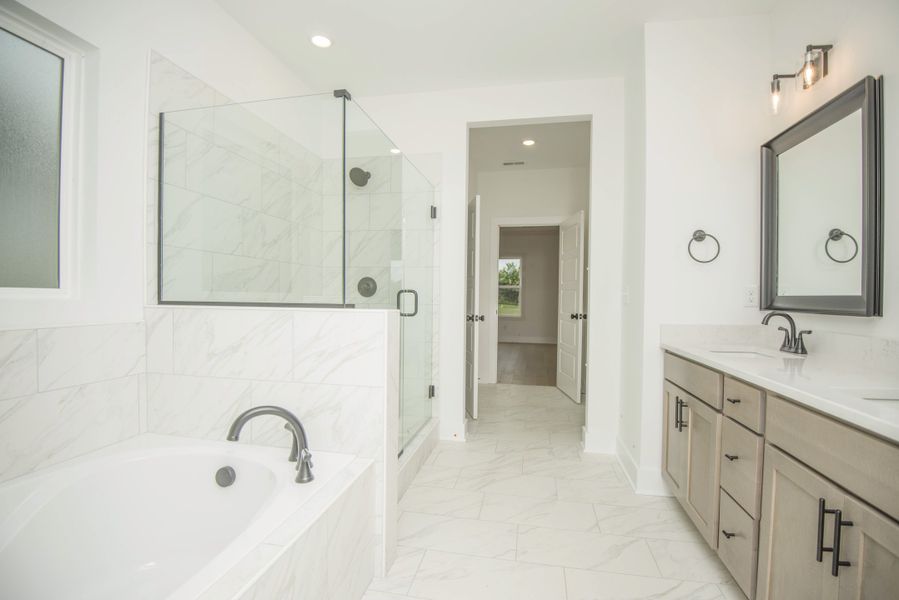 *Photo of example home. Selections and Finishes May Vary.*