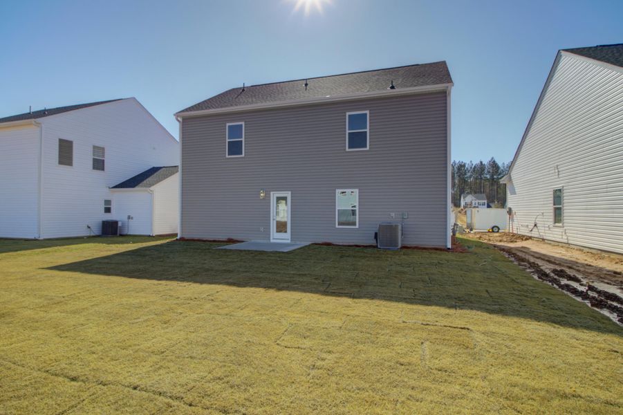 Exterior details and patio area of a home in , Ravenel (Image 4).