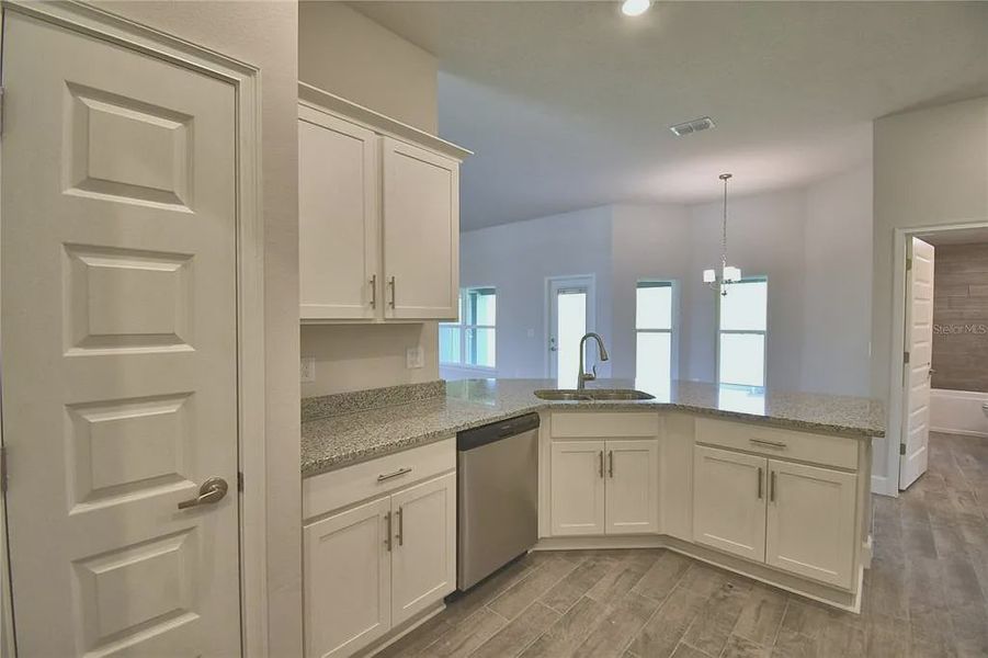 Furnished interior view inside a new home in Lake Juliana Estates, Auburndale (Image 8).