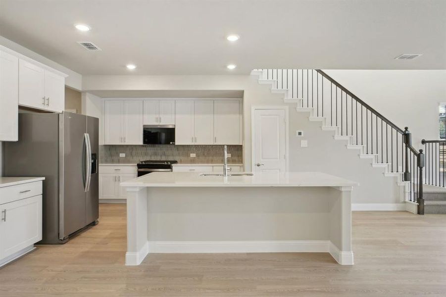 Photo is not of the actual home, but is an inspirational photo of builder’s model home and may depict options, furnishings, and/or decorator features that are not included.