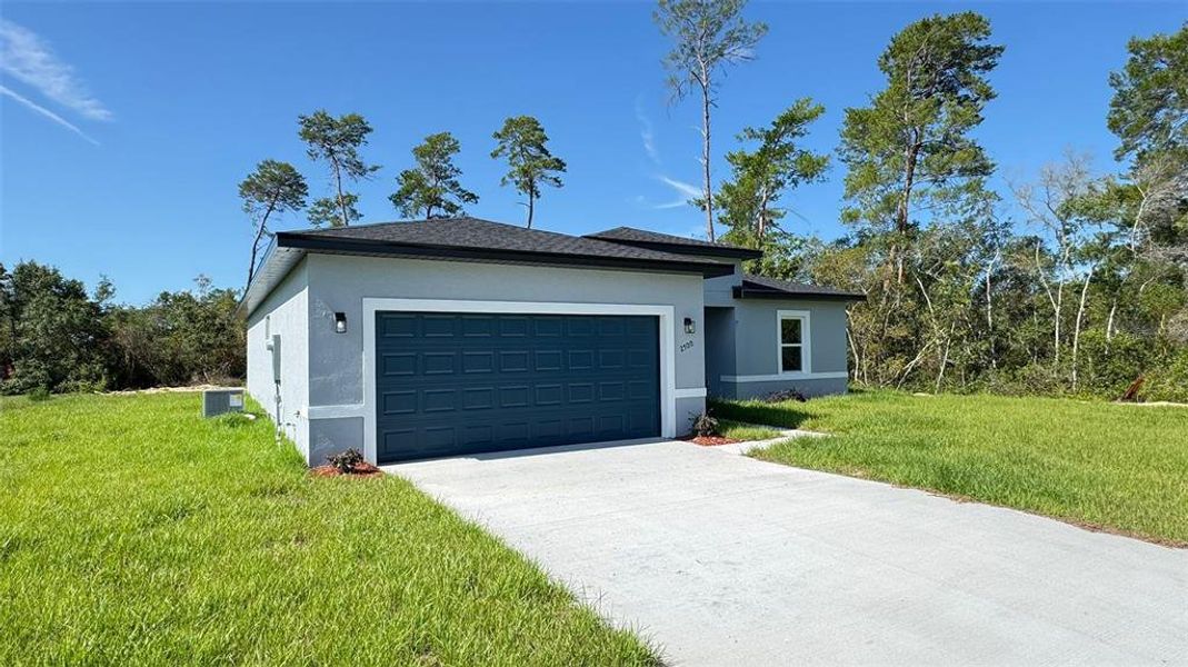Front exterior of a new home in , Ocala, FL, highlighting curb appeal (Image 2).