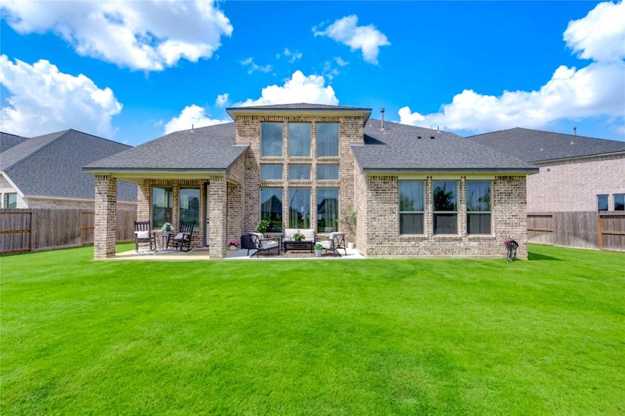 Exterior details and patio area of a home in Cross Creek West, Fulshear (Image 22).