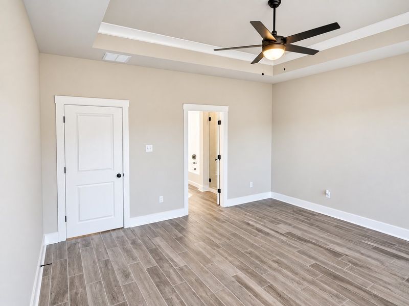 DSLD HOMES NEW CONSTRUCTION MOVE IN READY HOME IN LONGLEAF COMMUNITY LOCATED IN LUMBERTON, TX - Primary bedroom