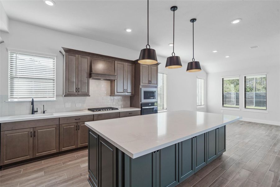 Furnished interior view inside a new home in ARTAVIA, Conroe (Image 5).