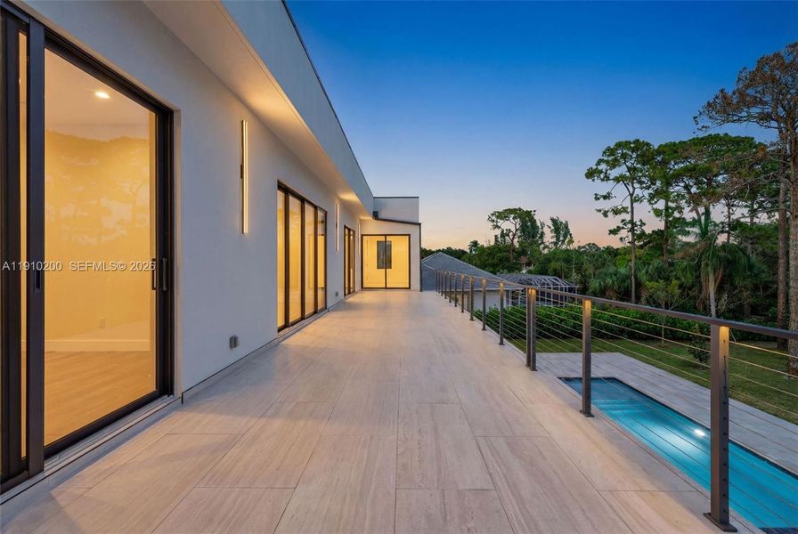 Exterior details and patio area of a home in , Parkland (Image 4).