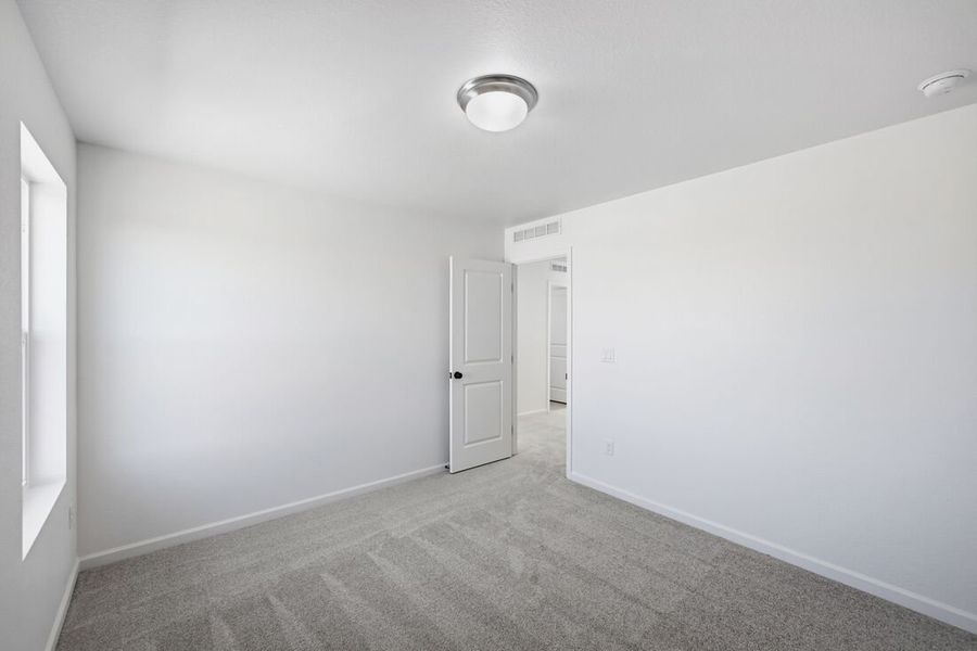 Spacious, unfurnished interior of a new home in Macanta, Castle Rock (Image 25).