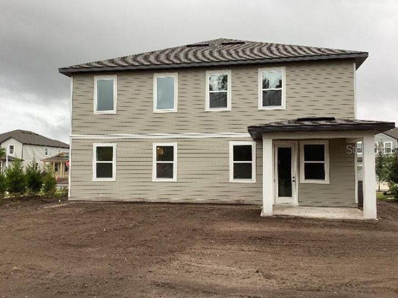 Exterior details and patio area of a home in Ellington Traditional, St. Cloud (Image 16).