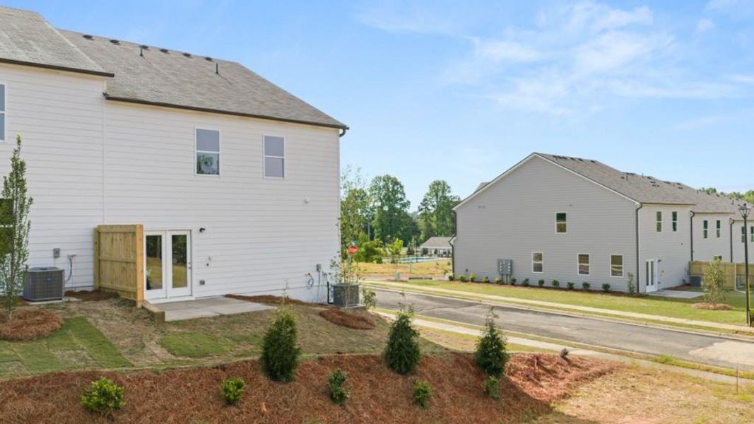Exterior details and patio area of a home in Village at Pine Valley, Gainesville (Image 3).