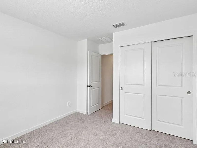 Spacious, unfurnished interior of a new home in Colbert Landings, Palm Coast (Image 20). Spacious, unfurnished interior of a new home in Colbert Landings, Palm Coast (Image 20).