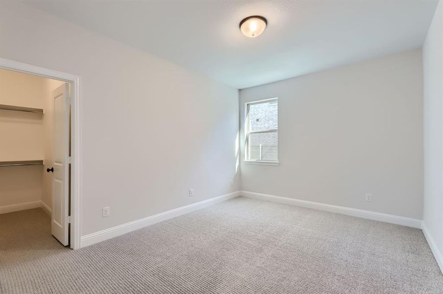 Spare room with light carpet