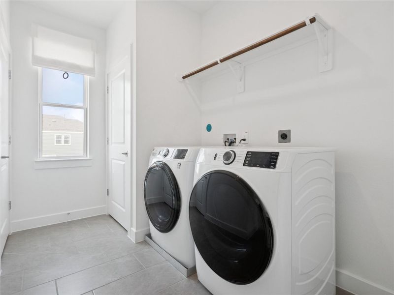 Laundry room (*Photo not of actual home and used for illustration purposes only.)