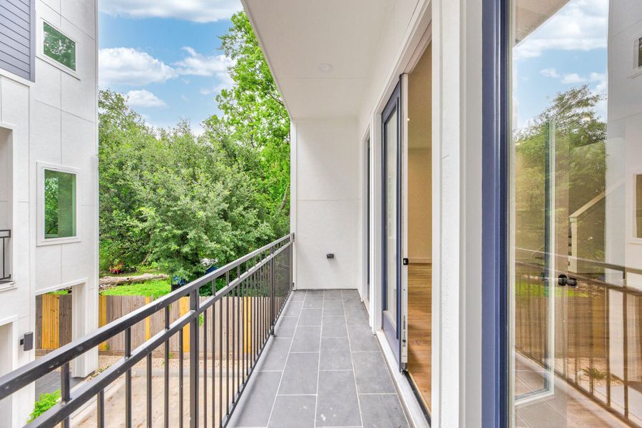 Exterior details and patio area of a home in , Houston (Image 23).