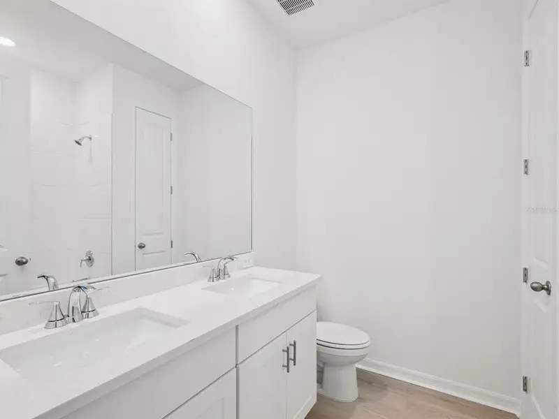 Furnished interior view inside a new home in Coasterra - Reserve Series, Palmetto (Image 7).