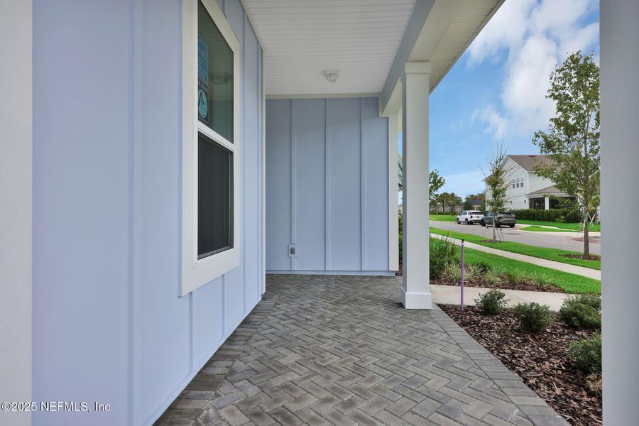 Front exterior of a new home in Seabrook Village at Seabrook, Nocatee, FL, highlighting curb appeal (Image 22).