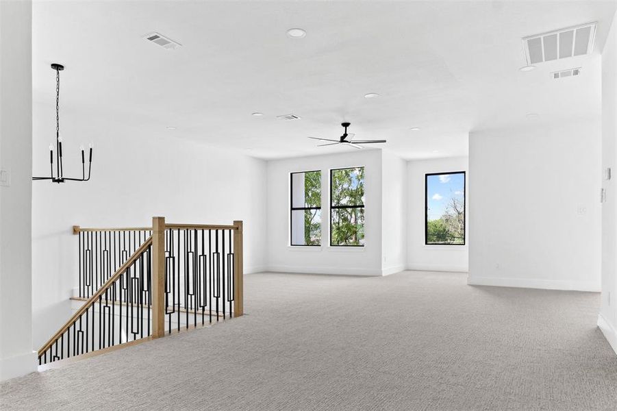 Unfurnished room with carpet flooring and ceiling fan