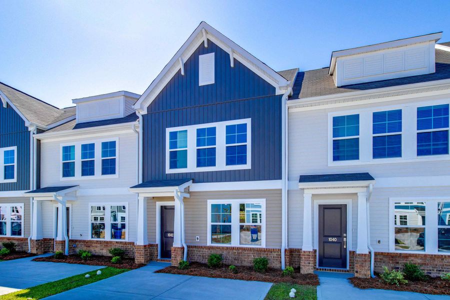 Front exterior of a new home in Astoria, Columbia, SC, highlighting curb appeal (Image 16).