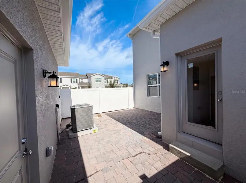 Exterior details and patio area of a home in , Apopka (Image 3).
