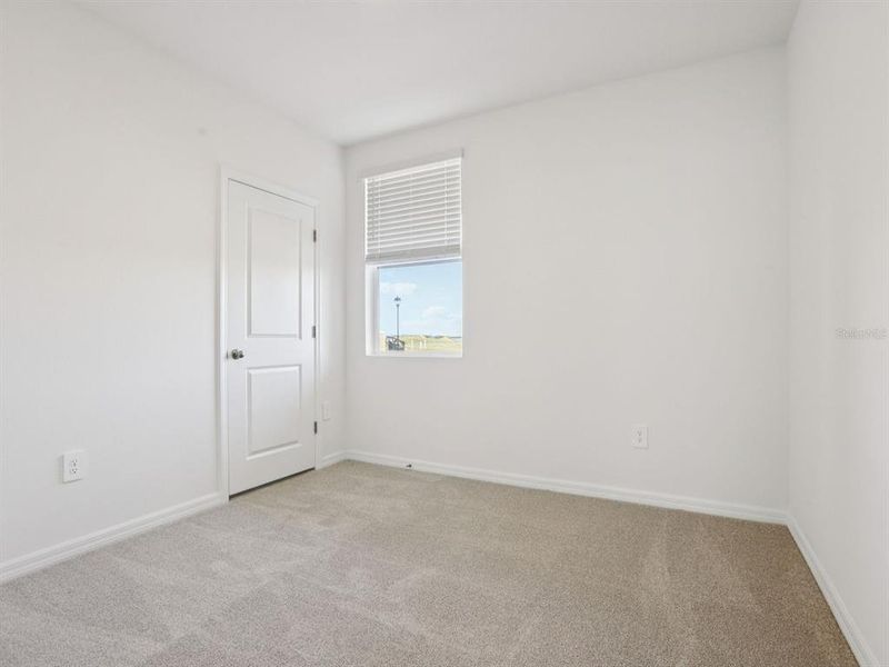 Spacious, unfurnished interior of a new home in Leyland Preserve - Premier Series, Brooksville (Image 12).