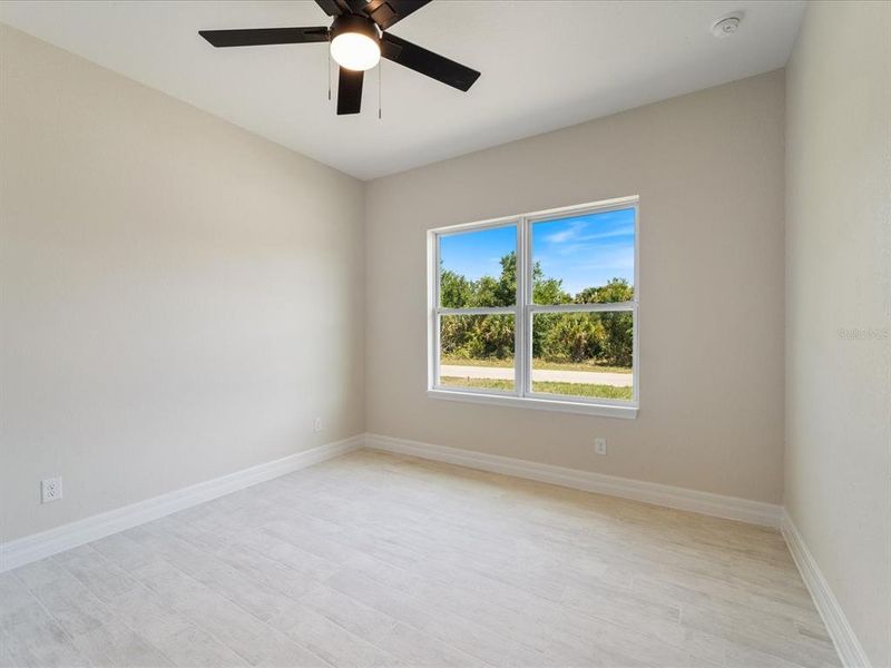 Spacious, unfurnished interior of a new home in , Port Charlotte (Image 17).