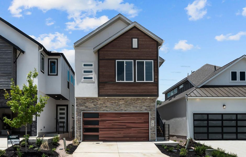 Front exterior of a new home in Centero at Stone Oak, San Antonio, TX, highlighting curb appeal (Image 17).
