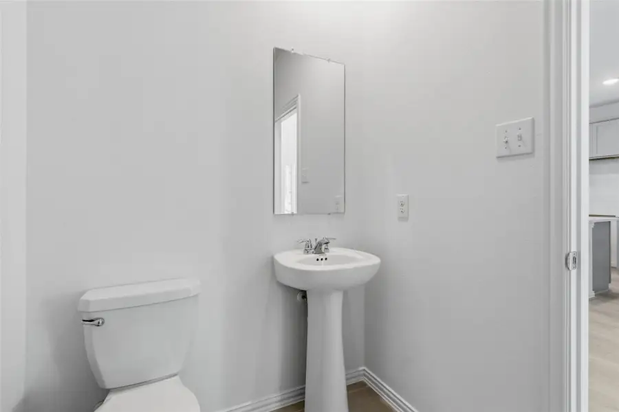 Furnished interior view inside a new home in Oakwood Estates, Waller (Image 7).