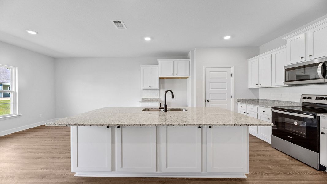 Representative furnished interior of a home built from the The Jasmine by D.R. Horton in Meadows at Rehwinkel, Crawfordville (Image 19).