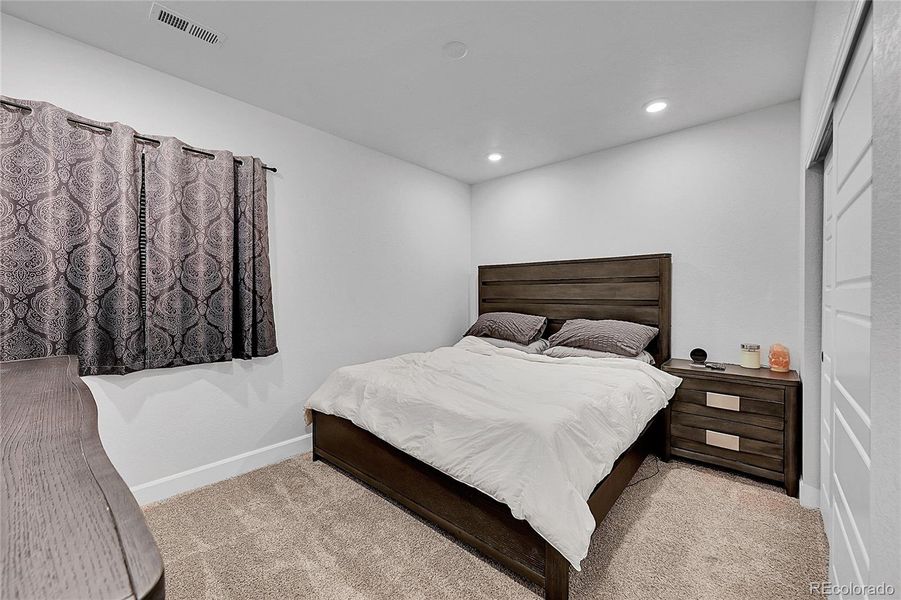 Basement Bedroom, offering perfect lightening, wouldn't know you're in the basement!!