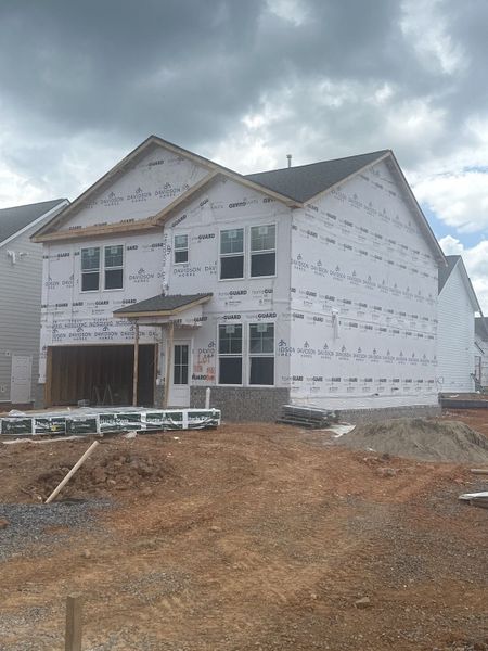 Front exterior of a new home in Sage Farms, White House, TN, highlighting curb appeal (Image 40).