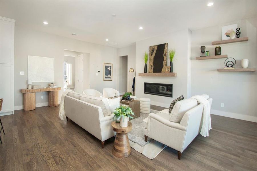 Living room featuring dark hardwood / wood-style floors