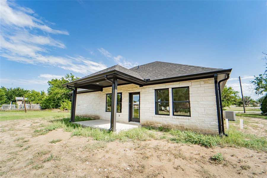 Rear exterior with covered patio