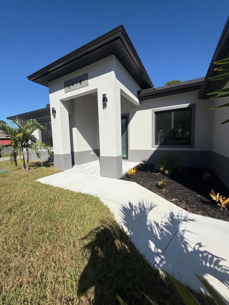 Exterior details and patio area of a home in , Lehigh Acres (Image 2).