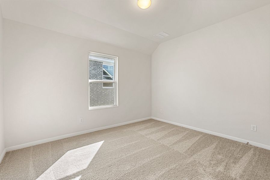 Representative unfurnished interior of a home built from the Somerville by Ashton Woods in Willow Springs, Buda (Image 40).