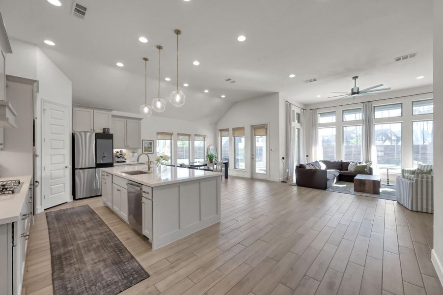 An immediate wow—natural light pours through the large windows across the main living areas. An immediate wow—natural light pours through the large windows across the main living areas.
