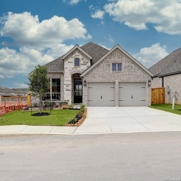 Front exterior of a new home in Arcadia Ridge, San Antonio, TX, highlighting curb appeal (Image 2).
