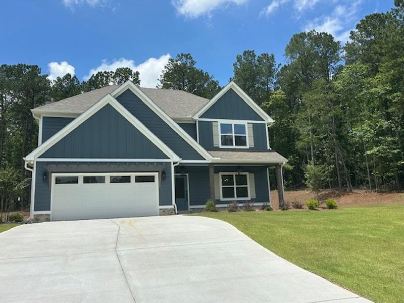 Front exterior of a new home in Sagebrook, Newnan, GA, highlighting curb appeal (Image 2).
