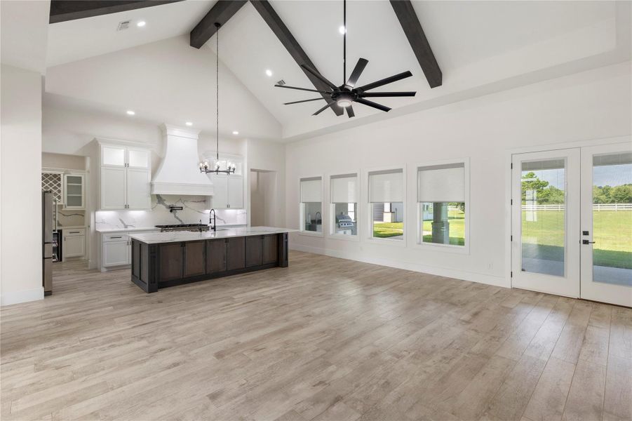 This massive living room and kitchen offers so much space for entertaining family and friends. This massive living room and kitchen offers so much space for entertaining family and friends.