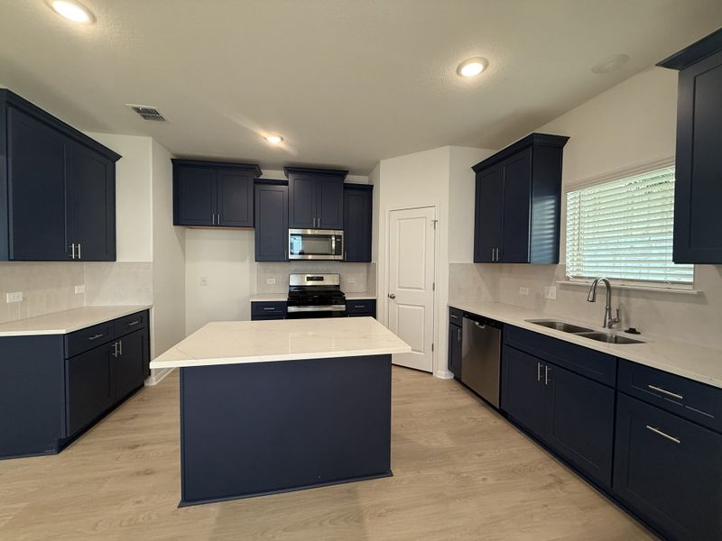 Furnished interior view inside a new home in The Hills of Bear Creek, Austin (Image 11).