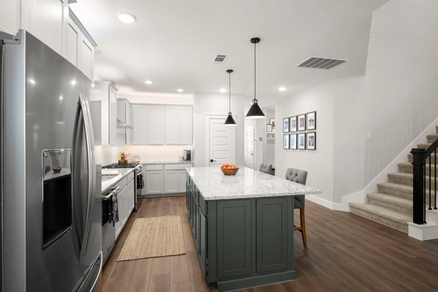 From the entry to the staircase, the open layout creates a natural flow through the home. From the entry to the staircase, the open layout creates a natural flow through the home.