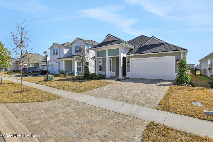 Front exterior of a new home in , Ponte Vedra, FL, highlighting curb appeal (Image 1). Front exterior of a new home in , Ponte Vedra, FL, highlighting curb appeal (Image 1).