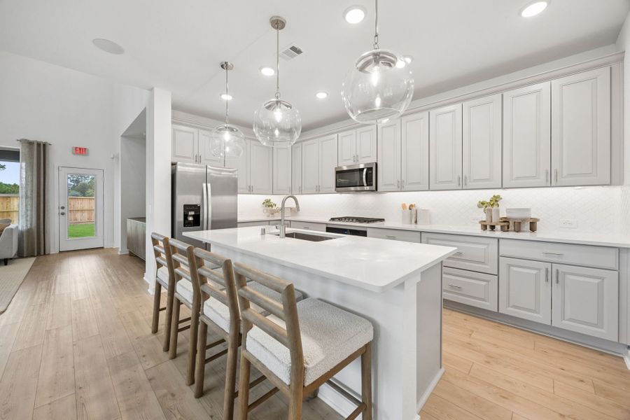 Representative furnished interior of a home built from the Riverdale by Pulte Homes in Mavera, Conroe (Image 11).
