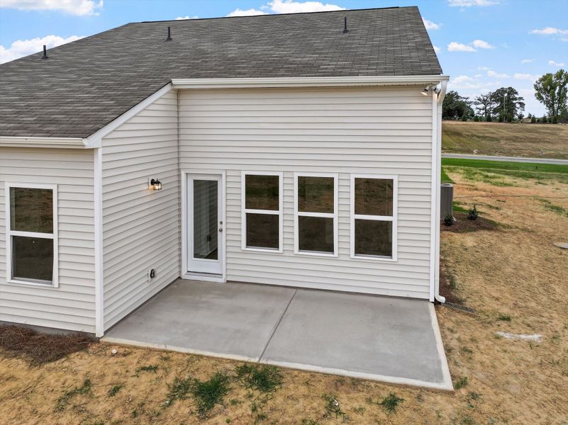 Exterior details and patio area of a home in Cambridge Reserve, Angier (Image 3).
