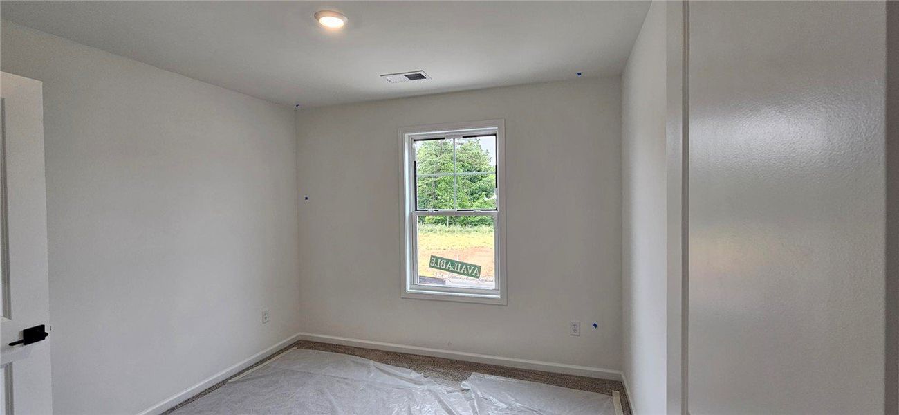 Bright and airy room featuring a single window, cr Bright and airy room featuring a single window, cr